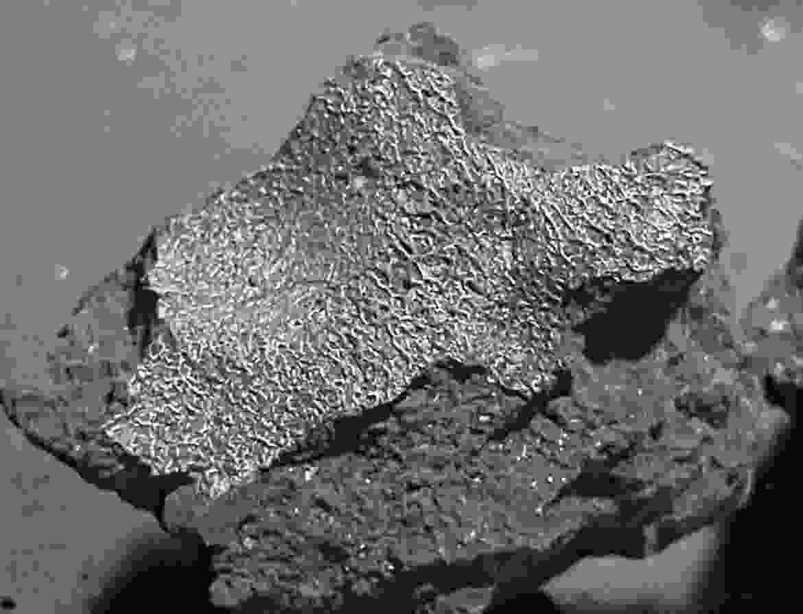A meteorite that crashed into a New Jersey home contains rare evidence of ancient salty water and organic molecules tied to life’s origins.