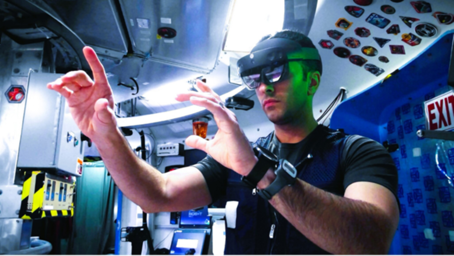 A research volunteer uses augmented reality goggles to perform astronaut-like tasks during a simulated space mission.