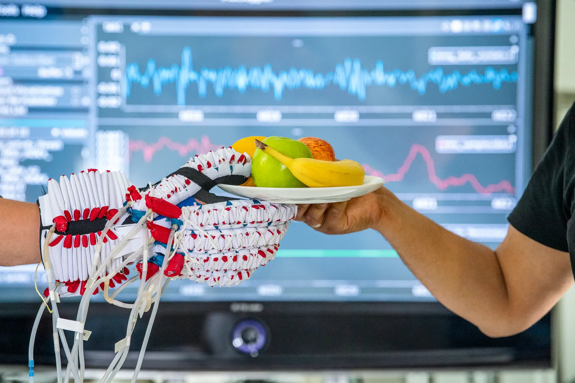 The Soft-Hand exoskeleton assists people with paralyzed hands.