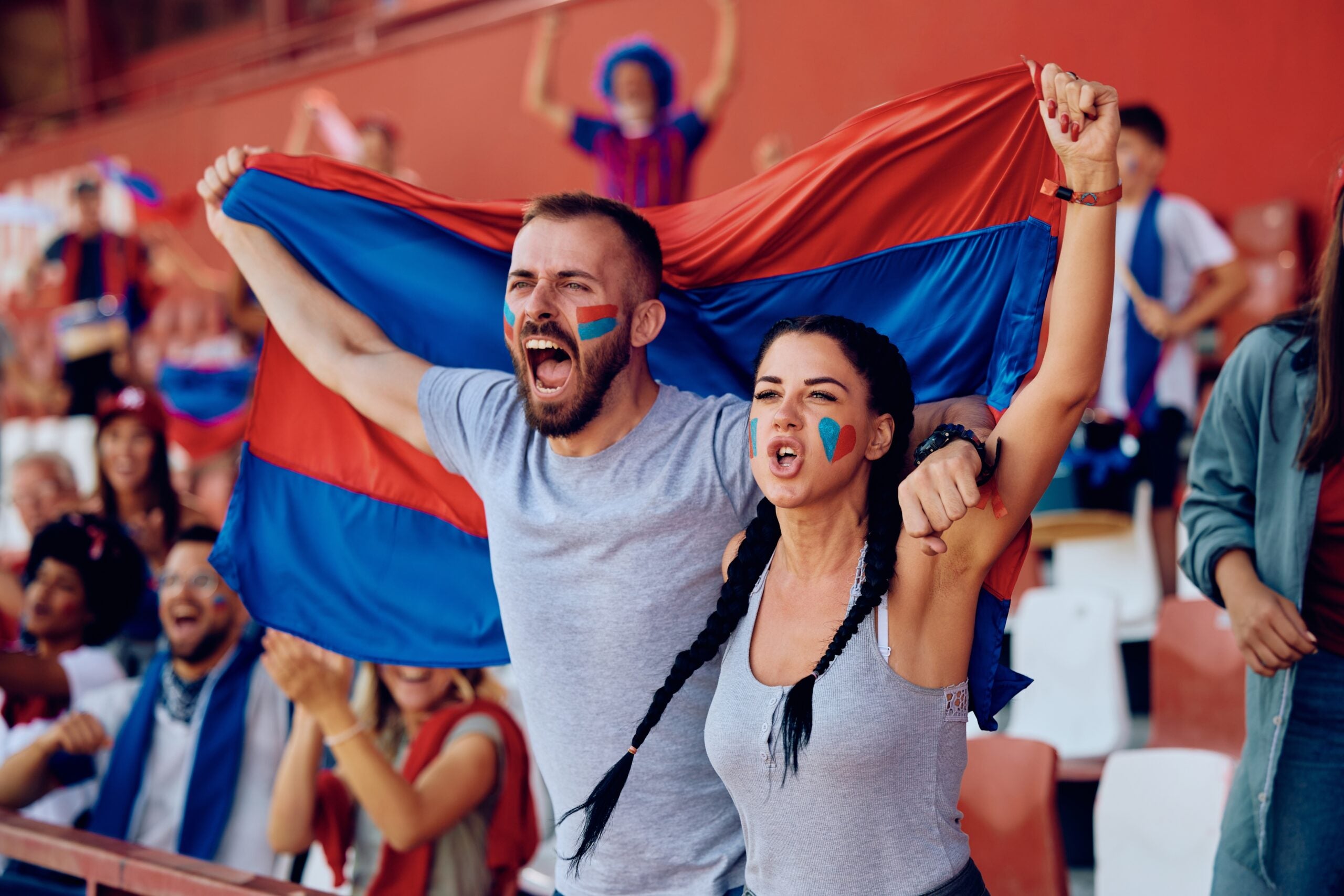 Fan Travel Drives the Enormous Carbon Footprint of World Cups and Concert Tours