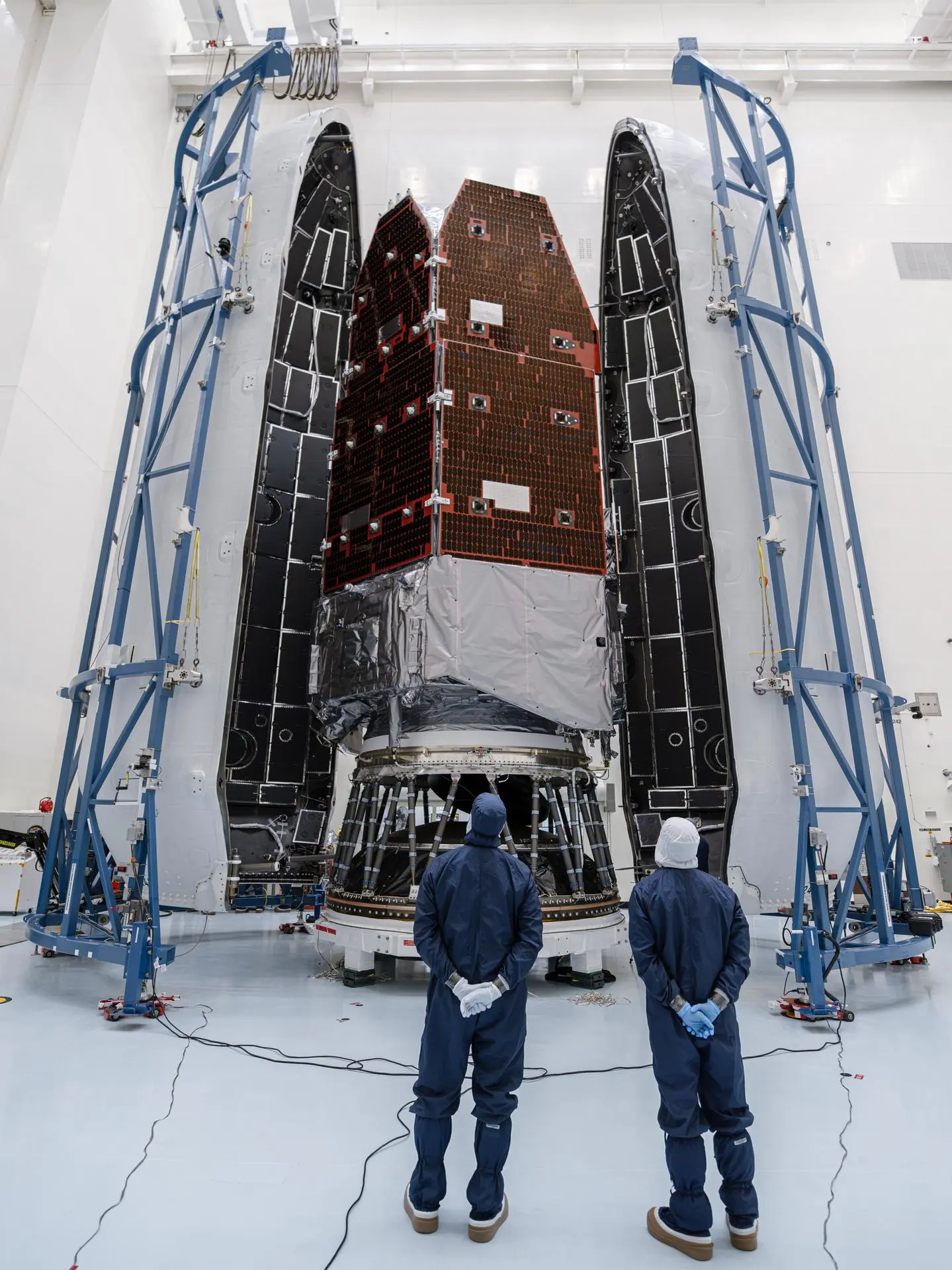 NASA’s Nancy Grace Roman Space Telescope is encapsulated within the payload fairing at the agency’s Kennedy Space Center in Florida, ahead of mating to a SpaceX Falcon Heavy rocket for launch. 
