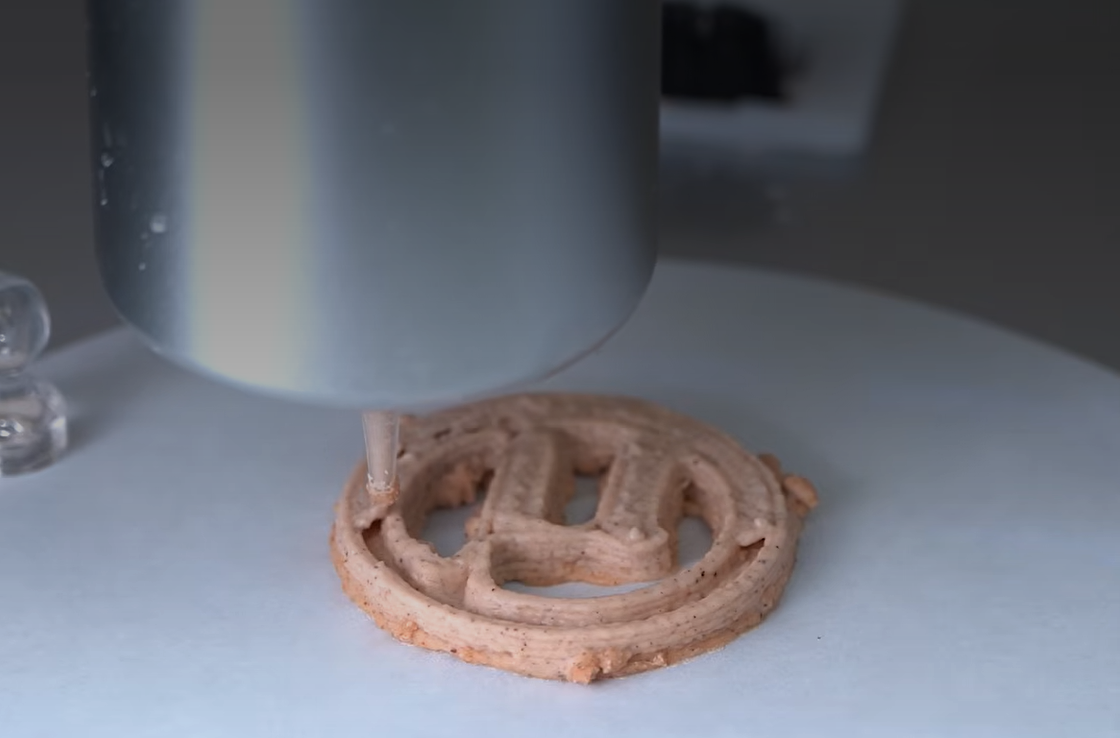 The team then adds fiber, starch and sweetener. That mixture is extruded through a 3D printer to form protein-rich cookies called µBites, pronounced “microbites.”