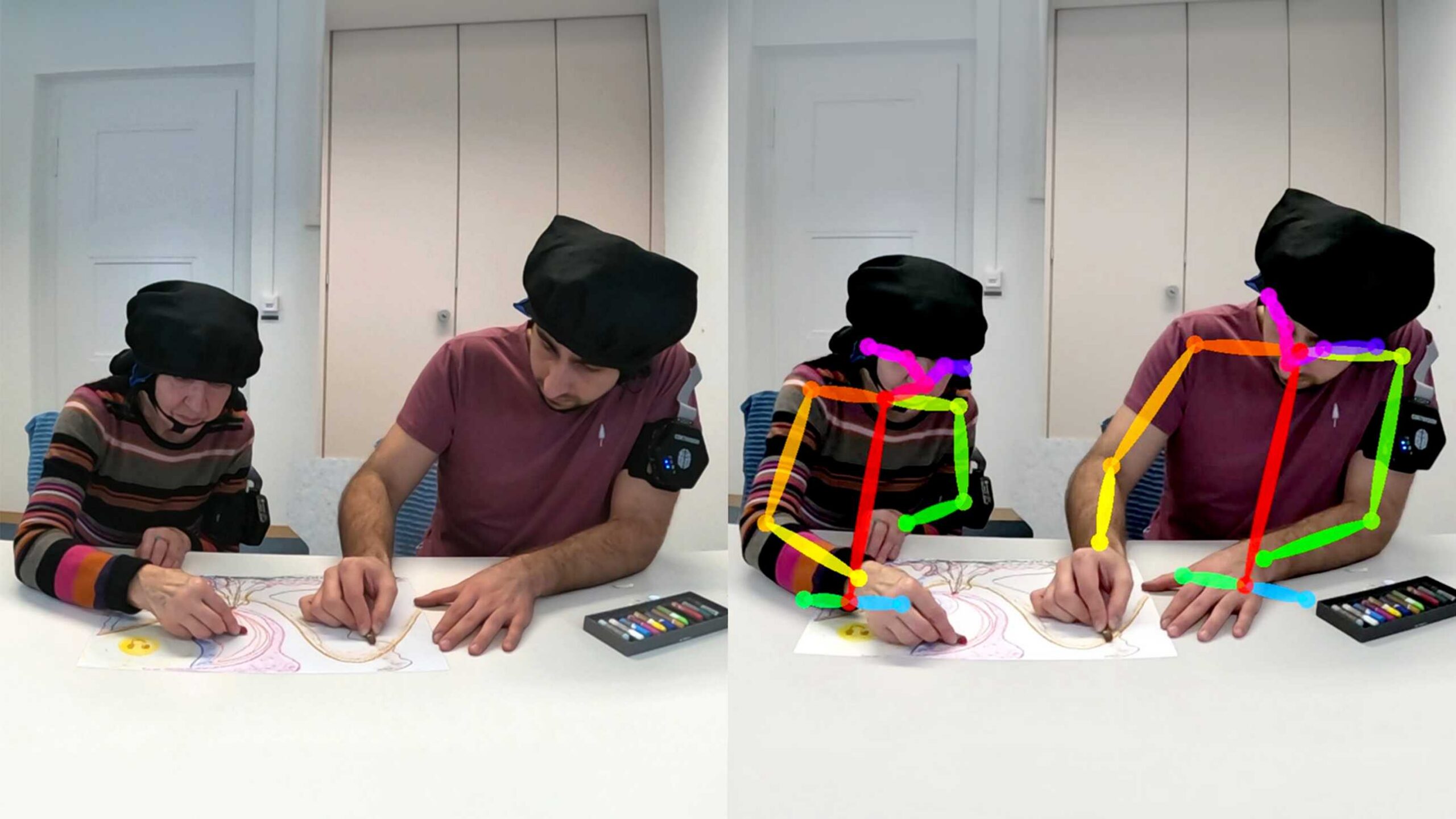 With the help of portable brain-scanning technology (fNIRS), the ETH researchers recorded the brain activity of two people while they were drawing at the same time. The lightweight caps fitted with sensors measure changes in blood flow in the brain – while allowing participants complete freedom of movement. The colourful lines show how the participants’ body movements were also captured, to be analysed in near future.