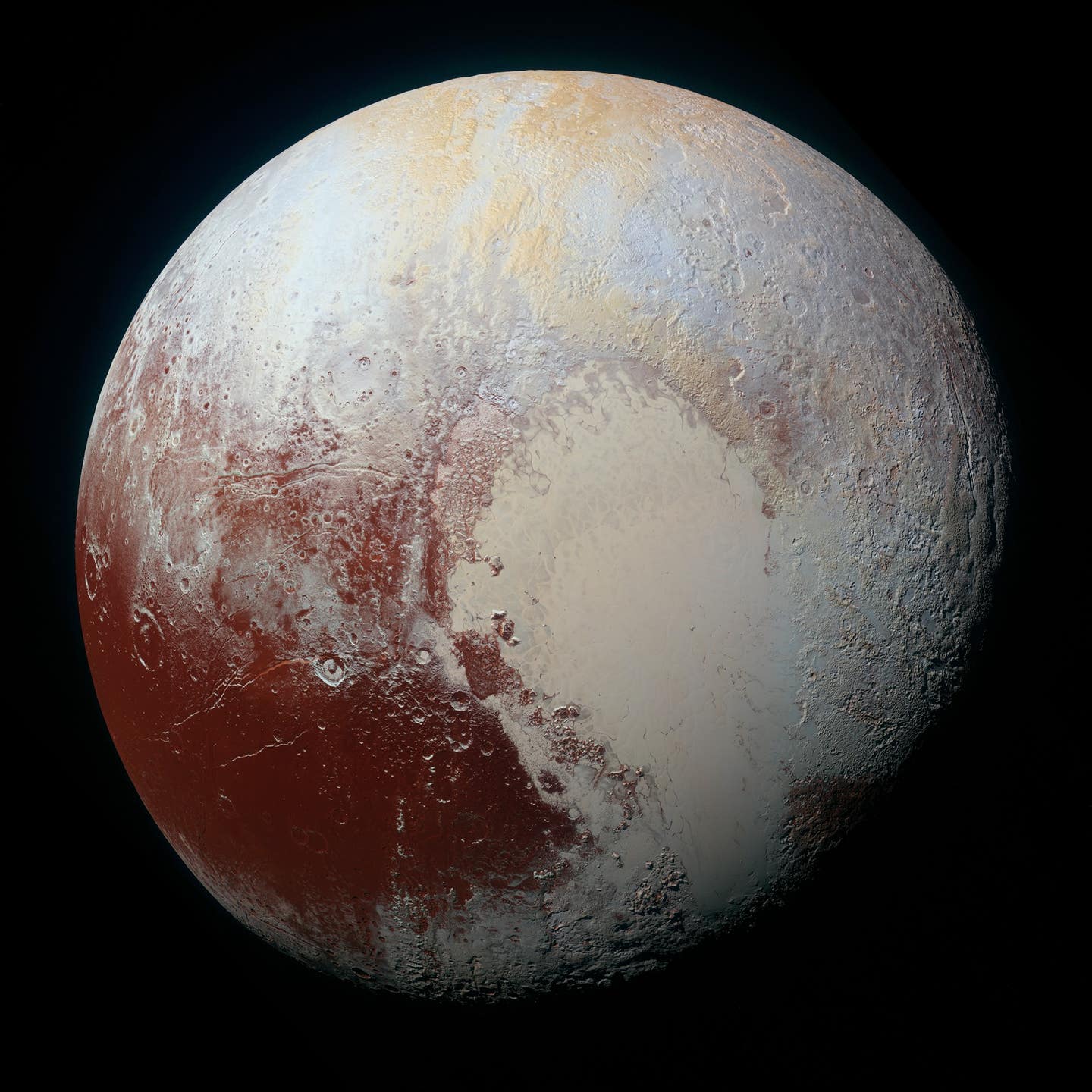 Dark markings on Pluto’s largest glacier may be evidence that liquid nitrogen recently rose and flowed across its surface.