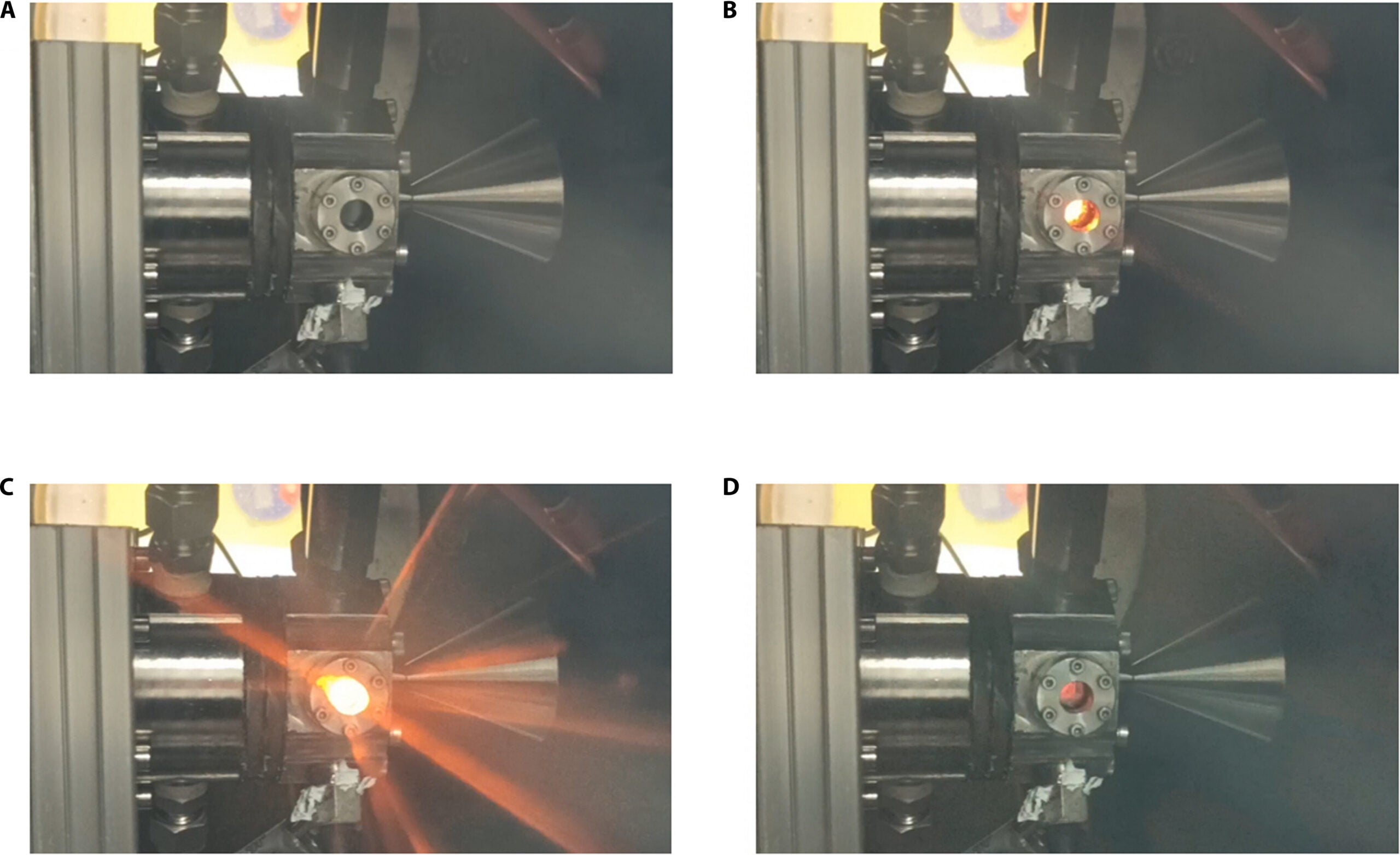 The images of the (A) preignition state, (B) arc loading, (C) ignition running, and (D) hot-fire ending of the thruster.