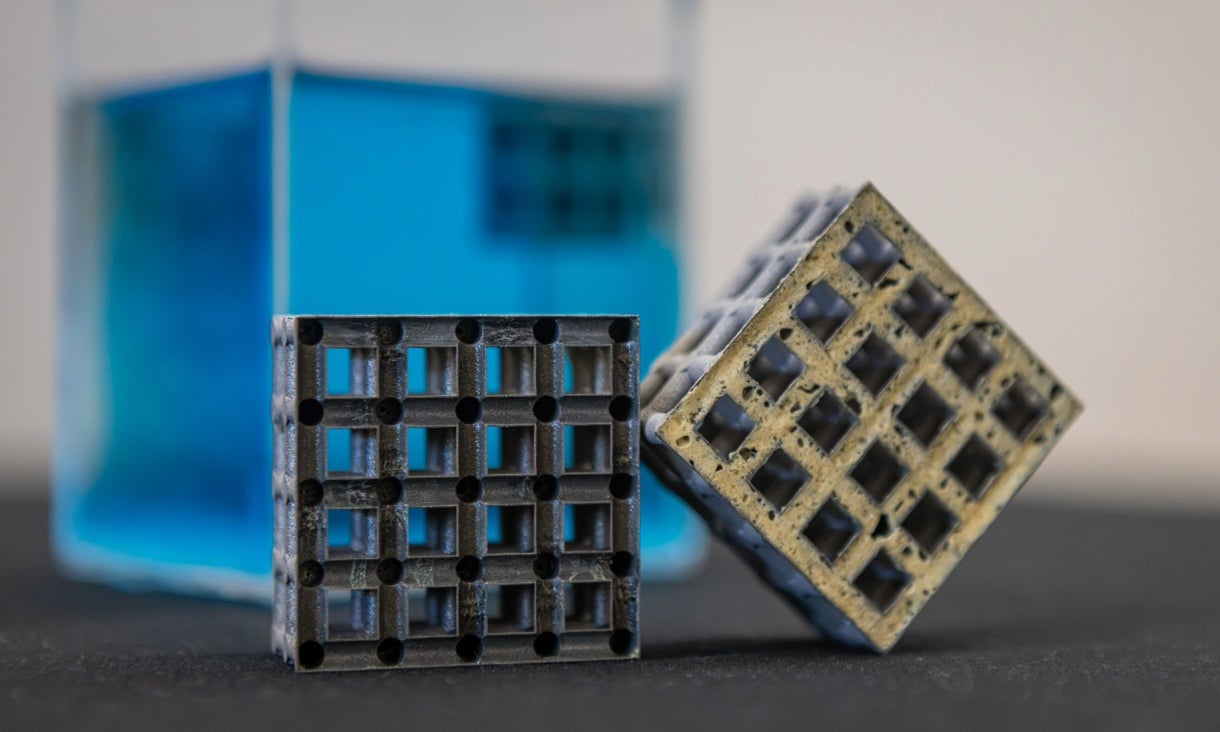 Cross sections of the titanium lattice cube showing before and after being filled with polyurethane foam for buoyancy. 