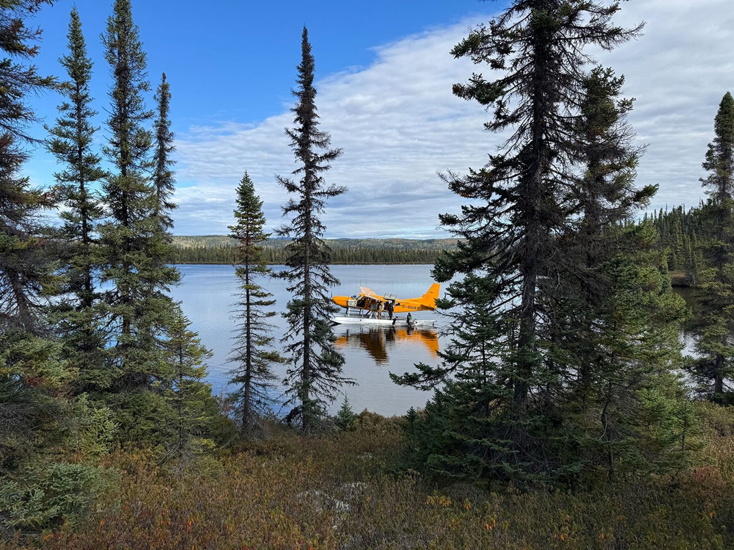 Researchers arrive by floatplane on Lake Marsal to study the impact crater in October 2025. 