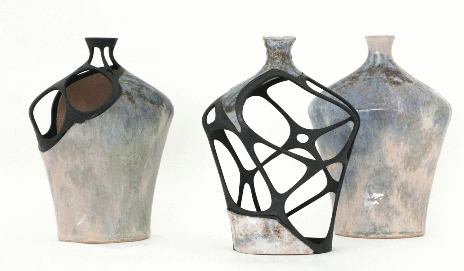 Hybrid reAssembledge. Three fragmented vases reassembled through computational design and additive fabrication are shown beside an intact vessel.