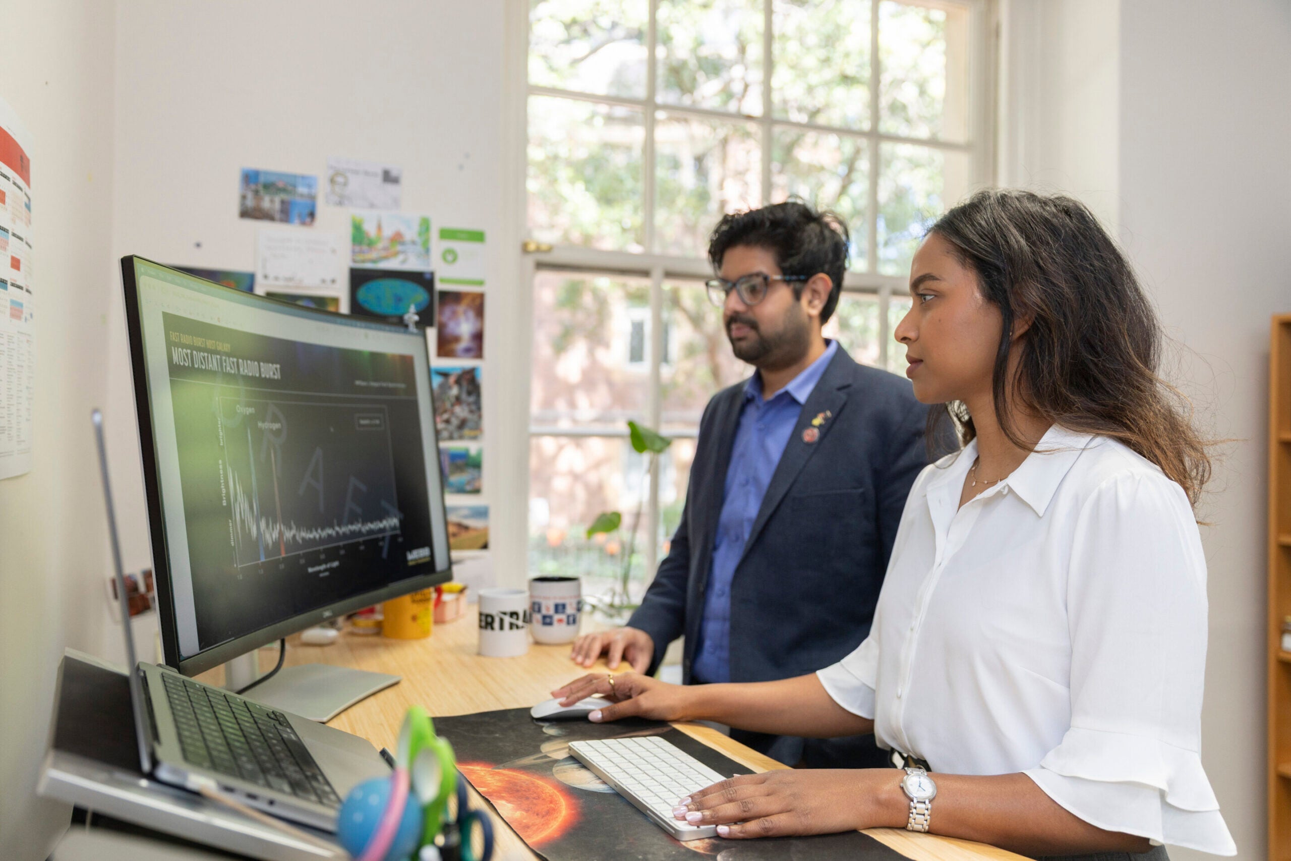Dr. Themiya Nanayakkara (left) and Dr. Manisha Caleb in the School of Physics offices at the University of Sydney.