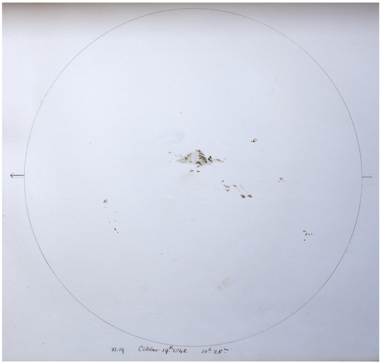 An 1848 sketch by British astronomer Temple Chevallier shows a massive sunspot group crossing the Sun’s Earth-facing center. The arrow marks the Sun’s apparent movement across the sky as Earth rotates. 