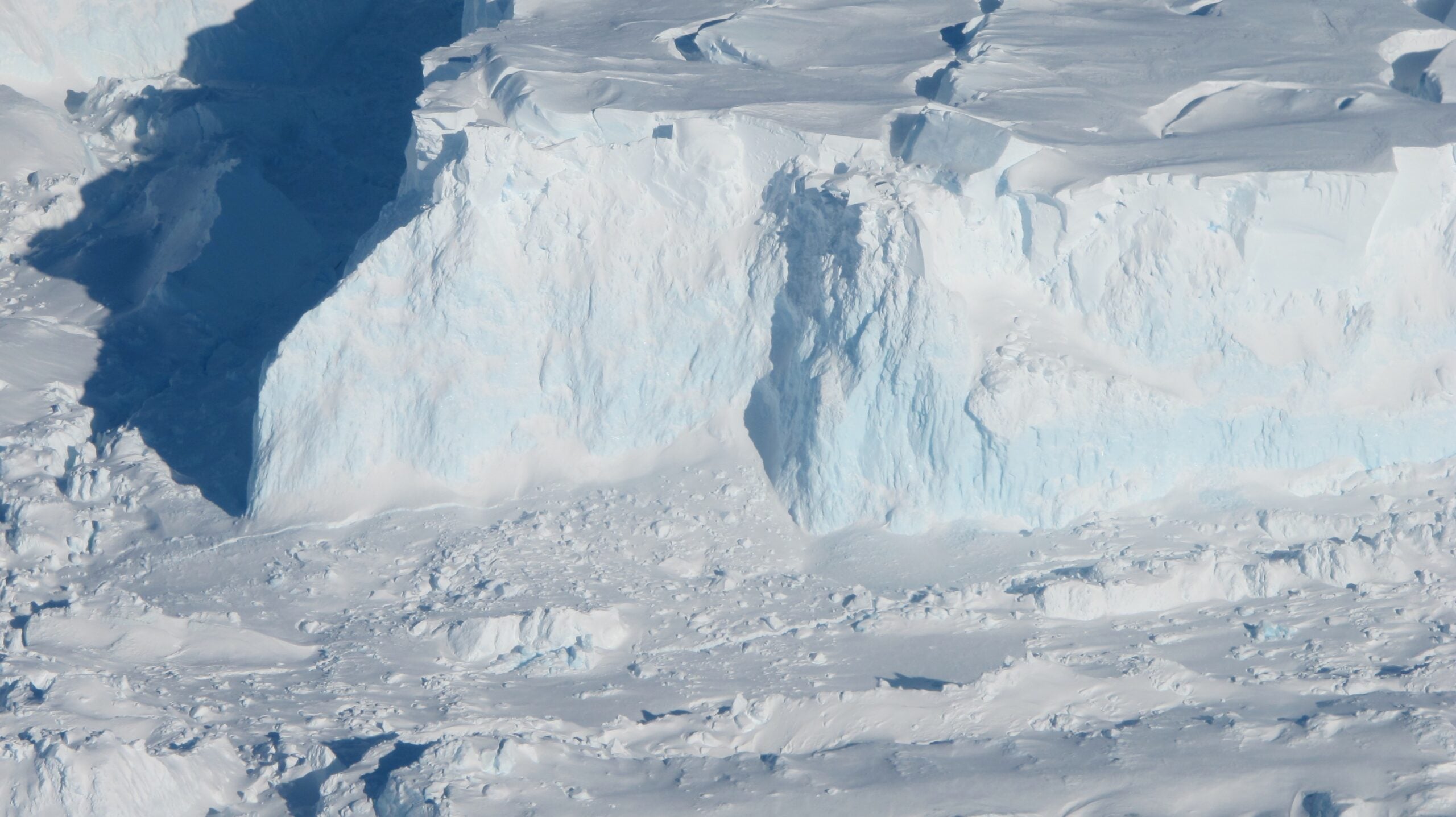 Close look at the Thwaites Ice Shelf edge as seen from the IceBridge DC-8 on Oct. 16, 2012. The blue areas of ice are denser, compressed ice.
