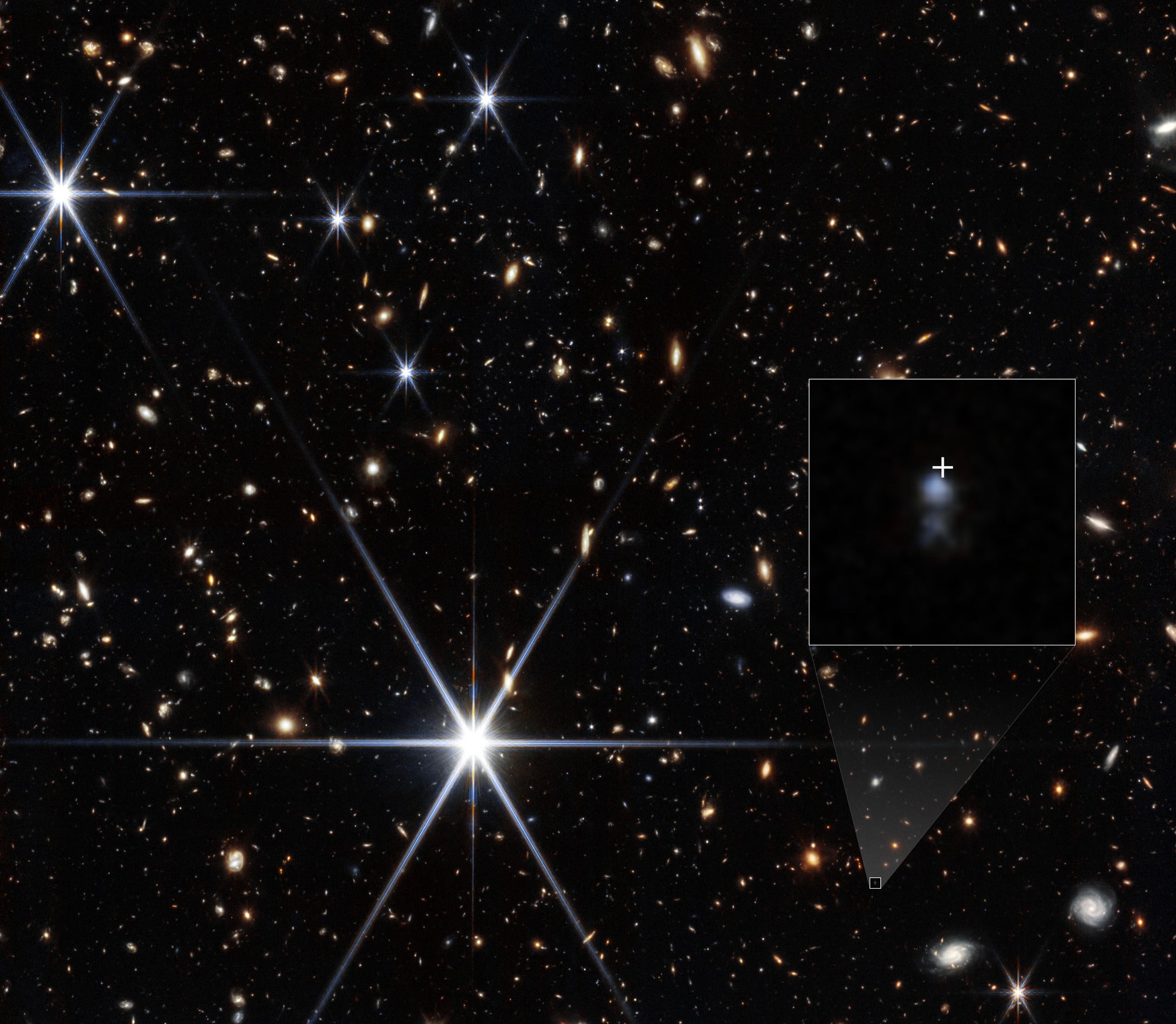 NASA’s James Webb Space Telescope’s NIRCam (Near-Infrared Camera) was able to detect the host galaxy of the fast radio burst called FRB 20240304B, whose location is shown by the white cross. They found it is a small dwarf galaxy actively forming stars
