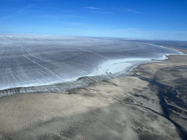 Aerial view of Barnes Ice Cap siwing the prominent 1960 trimline that wraps around ice cap.