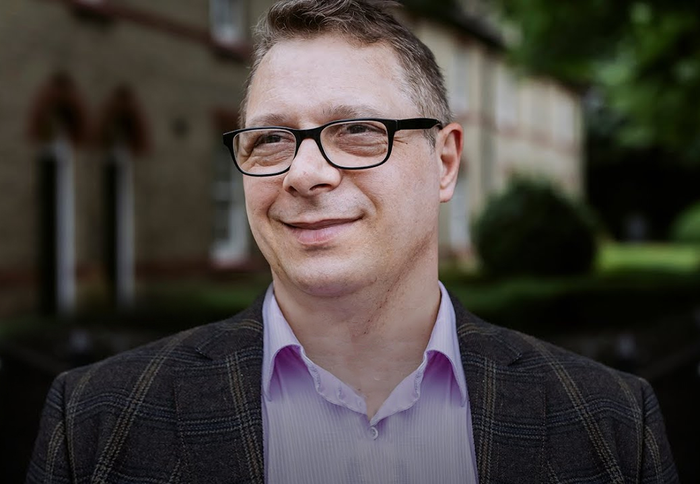 Dr. Melvin Vopson of the University of Portsmouth's School of Mathematics and Physics. 