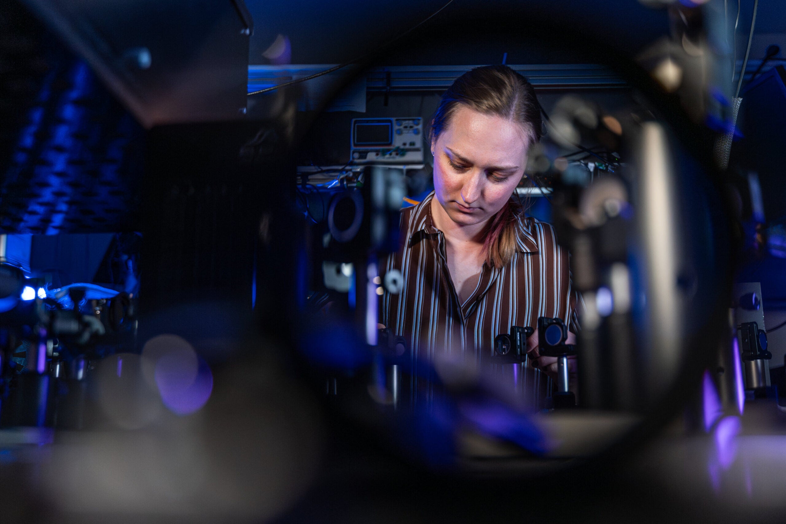 PhD candidate Nele Tornow in a laboratory for non-linear optics at the Institute of Solid State Physics at the University of Jena. 