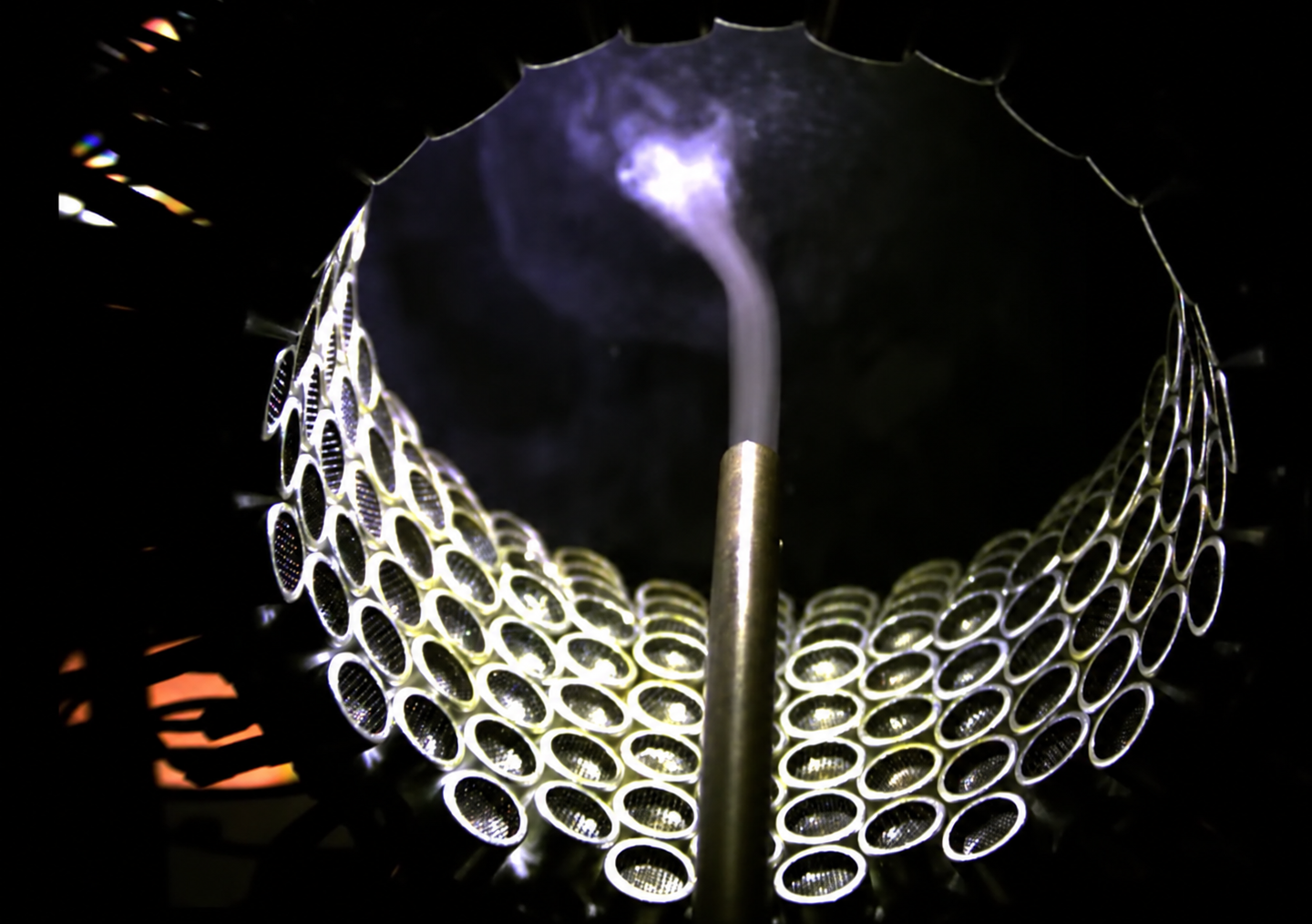 Water mist and gas running through an ultrasound tube emitted by 256 speakers.